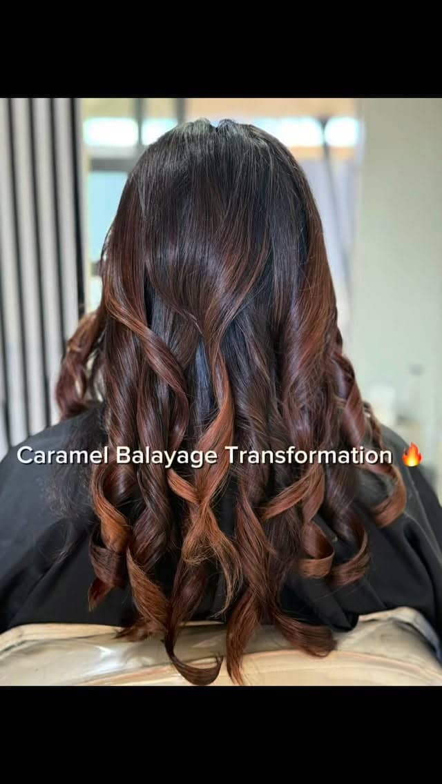 Back view of a caramel balayage transformation with defined curls
